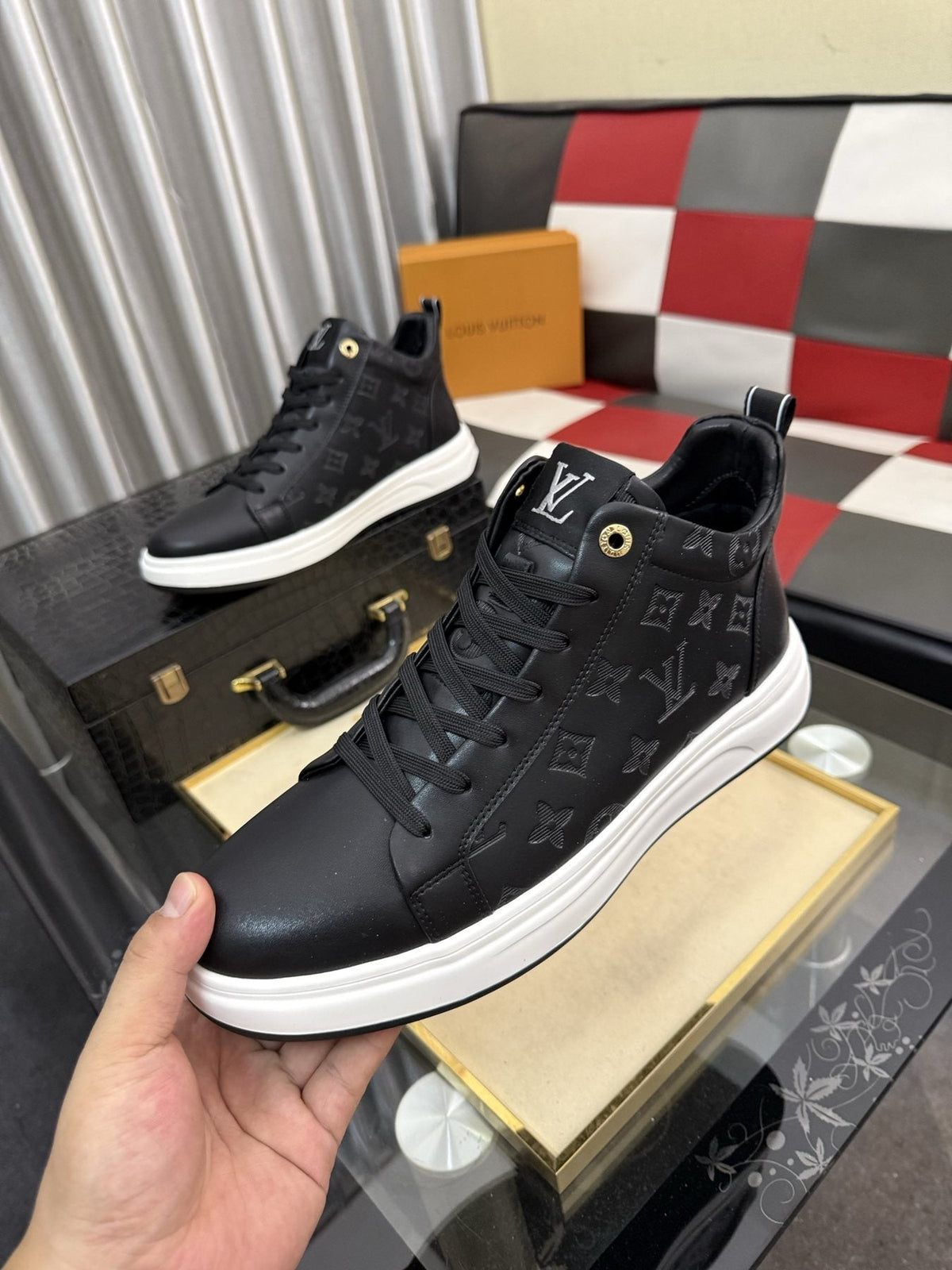 Louis Vuitton Embossed High-Top Sneakers — front